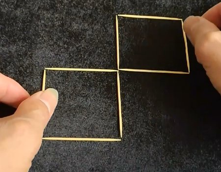 用8根牙签摆两个口字，动两根牙签变一个字