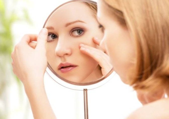 容光焕发拼音怎么读